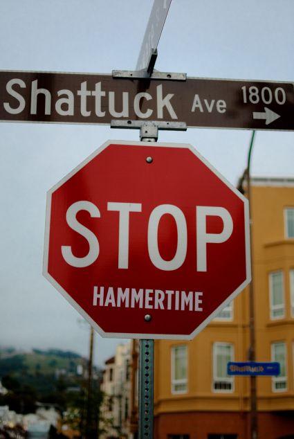 A stop sign in berkeley california tagged with "hammertime"